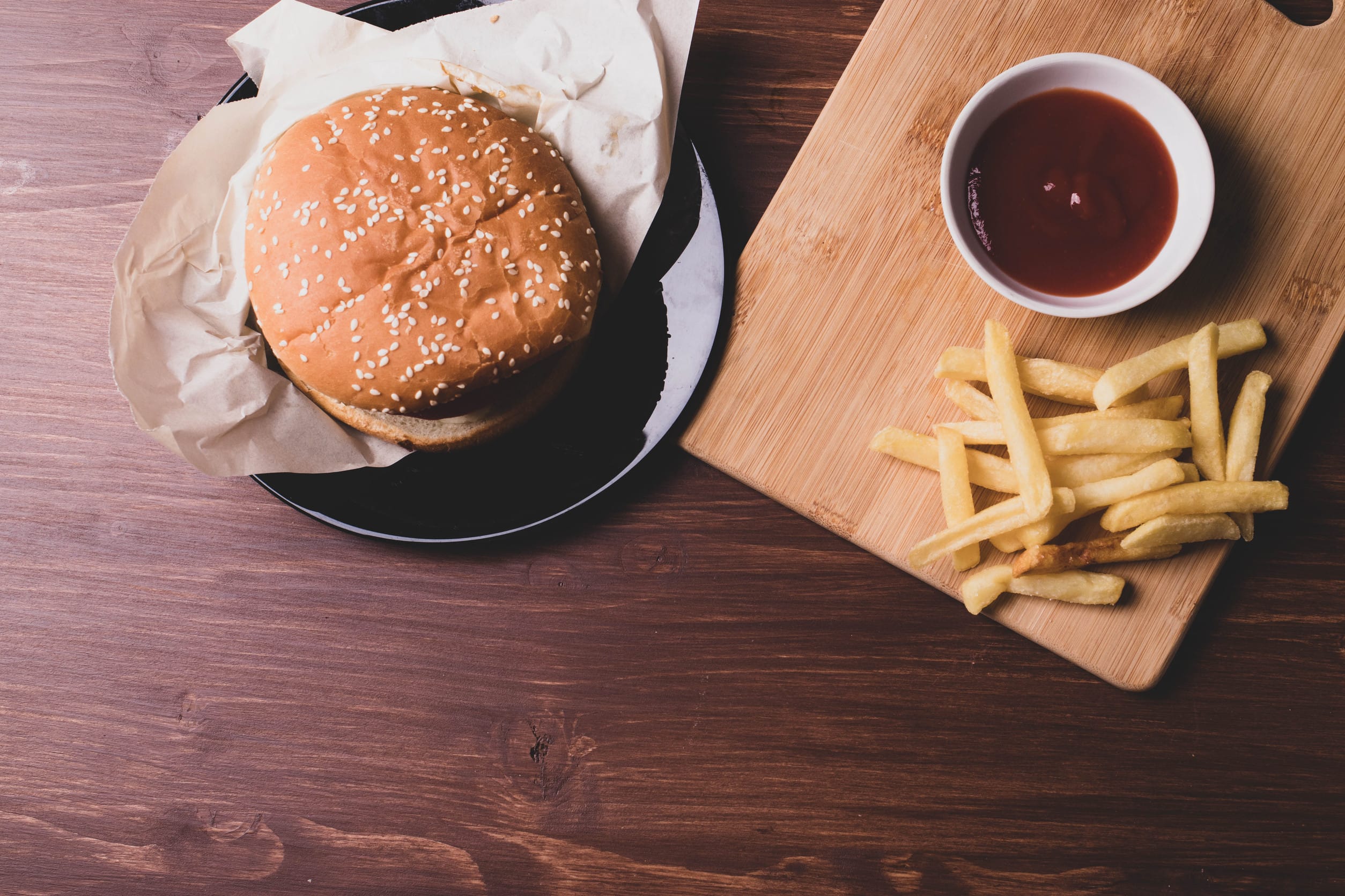 burger on rustic wooden surface