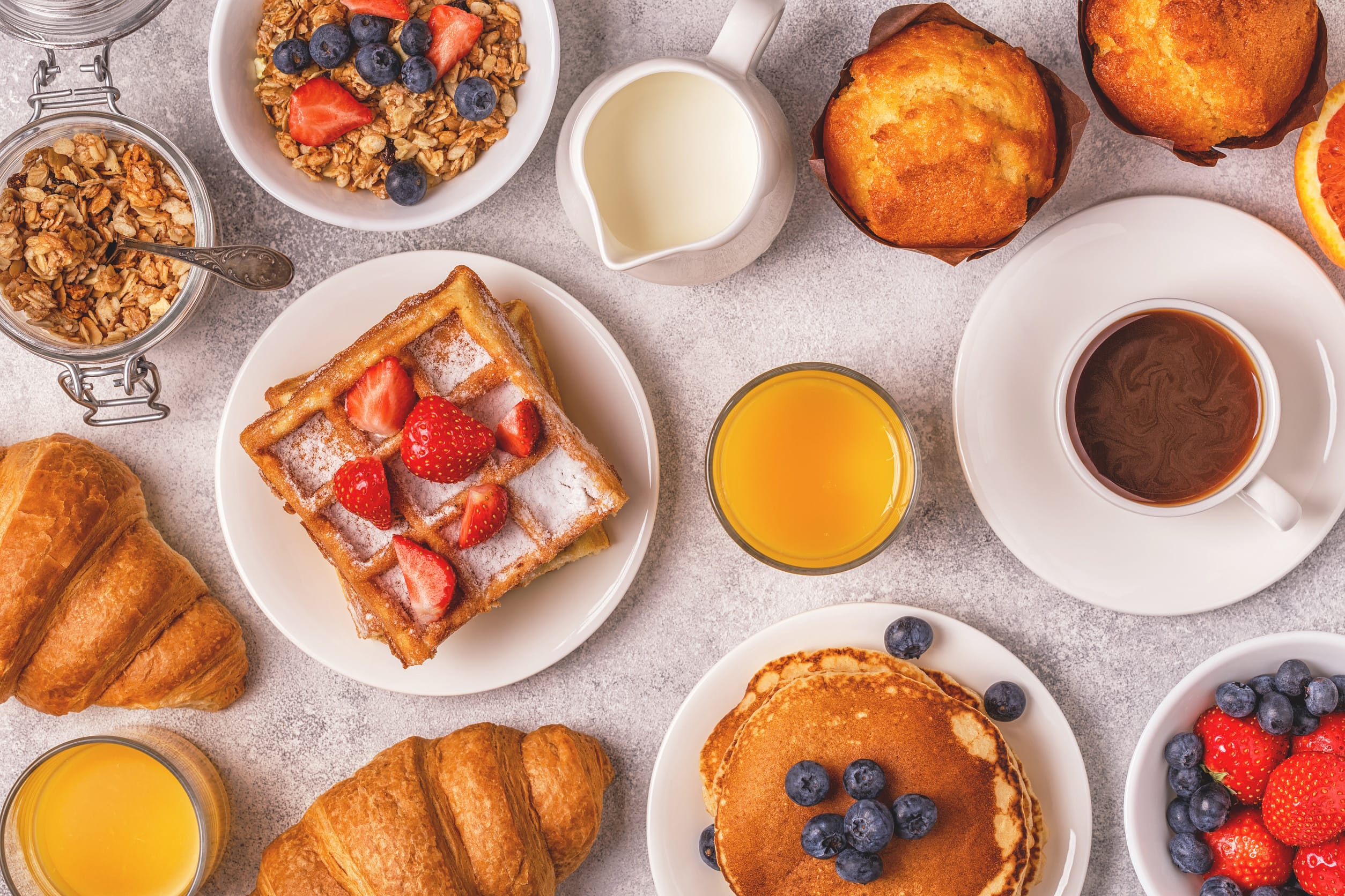 Delicious breakfast on a light table. breakfast foods