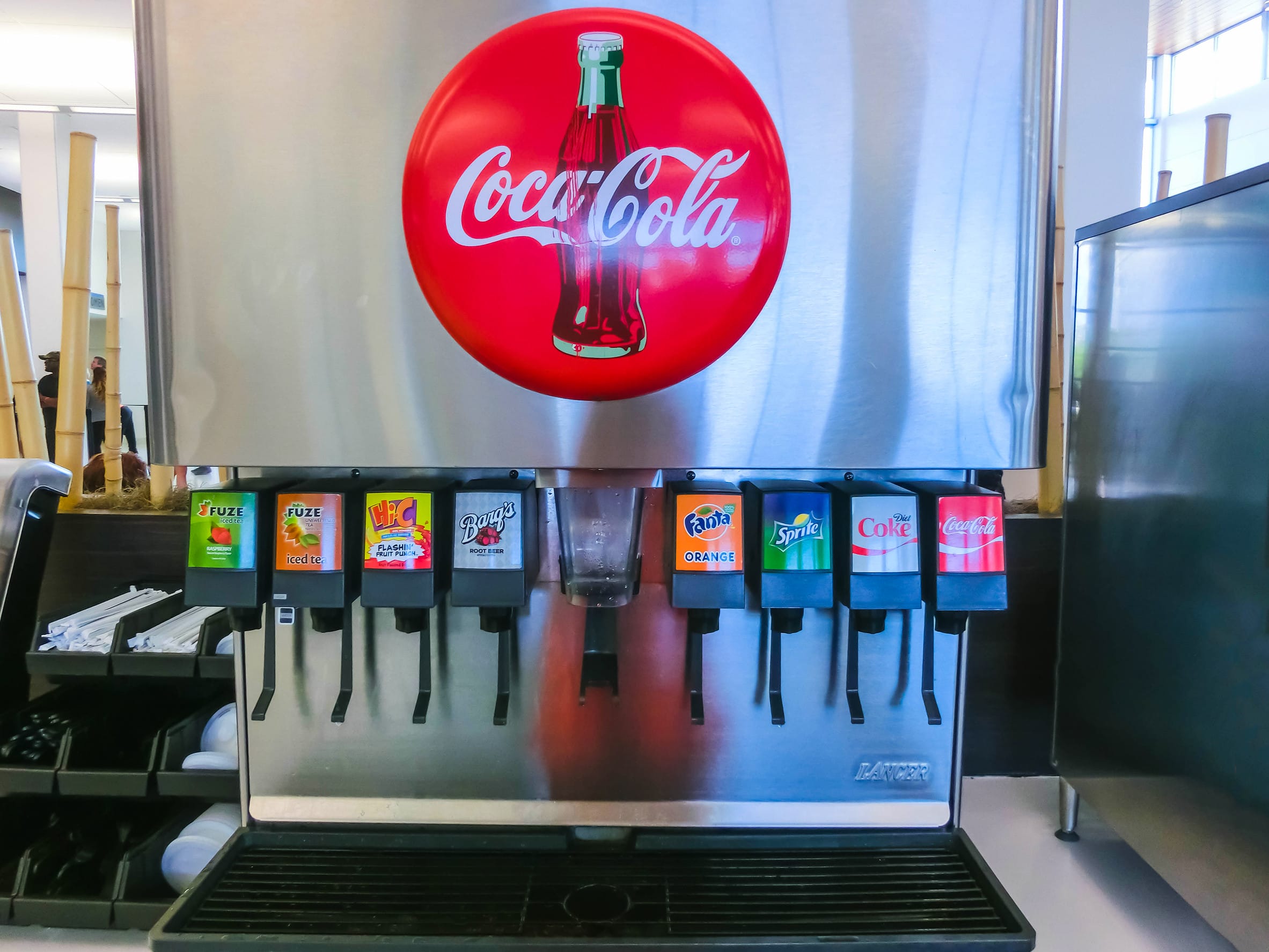 Orlando, USA – May 10, 2018: The Coca Cola automatic machine for people buy soft drink at Orlando free refills